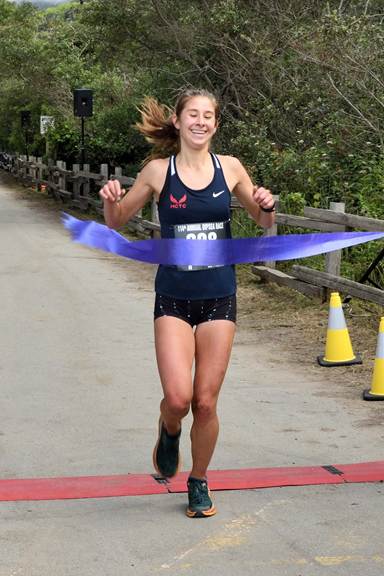 Audrey MacLean crossing the finish line for her first Dipsea win